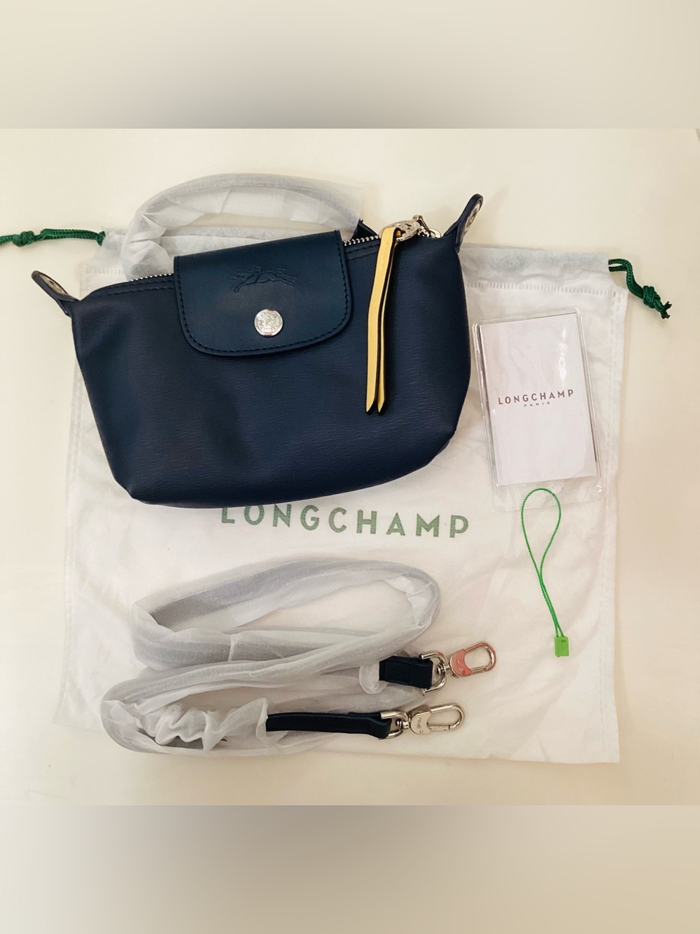 Longchamp Navy Crossbody Bag with Yellow Zip Pull Accent